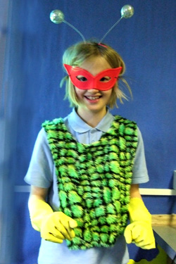 Child dressing up as part of the build a monster activity